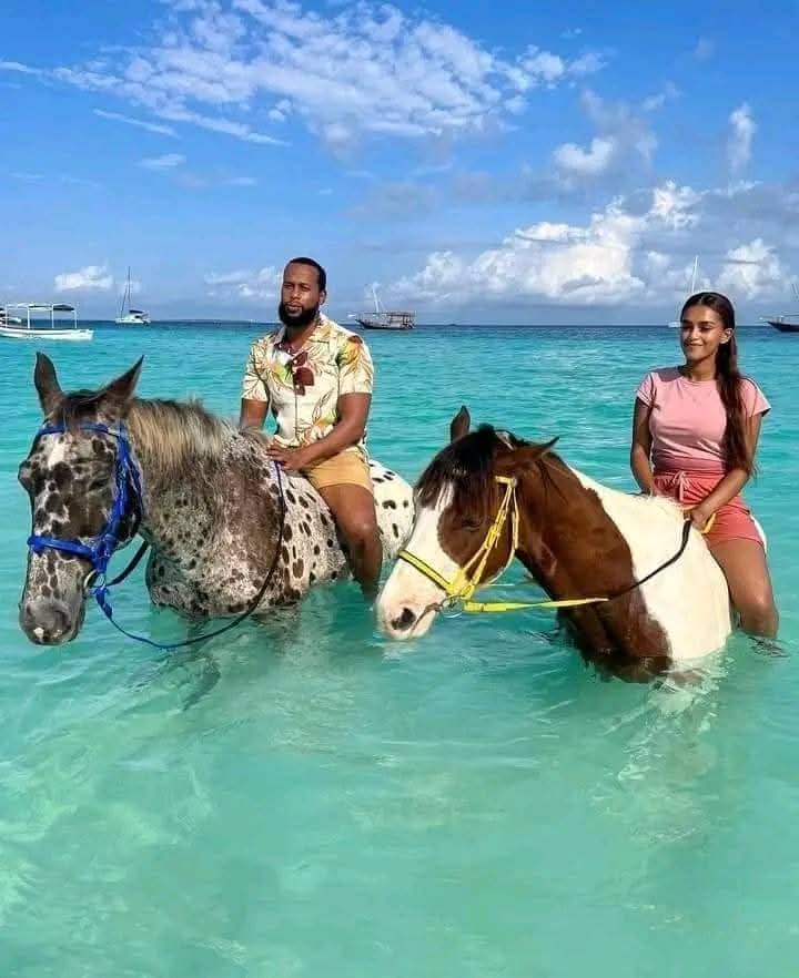 Horse riding through the turquoise shallows of Zanzibar