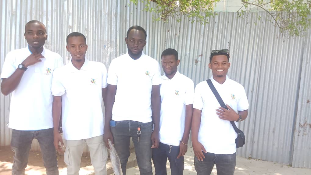 The Zanzibar Heavenly team in branded white polo shirts